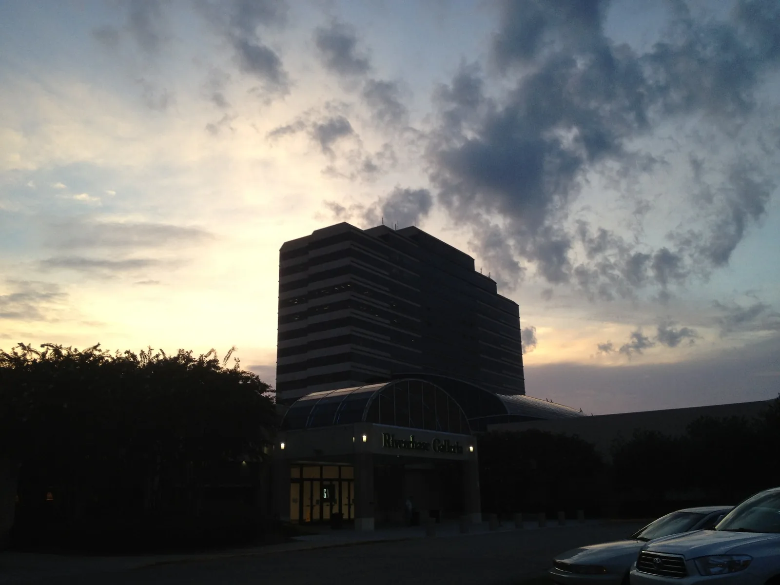 A Riverchase Galleria entrance and the tower above it at dusk in Hoover.