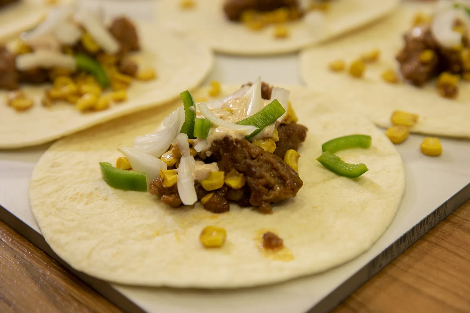 Street corn tacos on a plate, photographed by Alabama Extension.